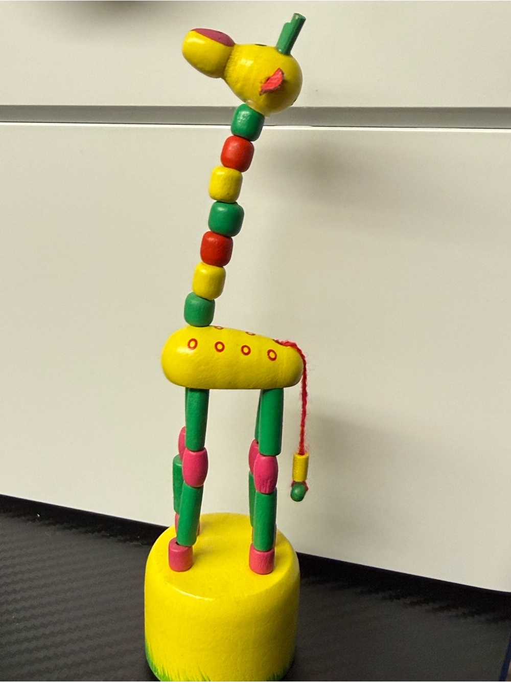 Wooden Giraffe bend down toy